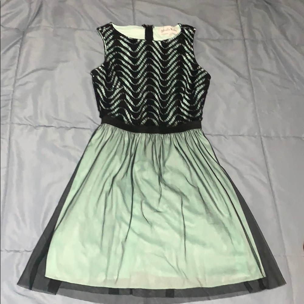 Beautiful sheer and crocheted cocktail dress.